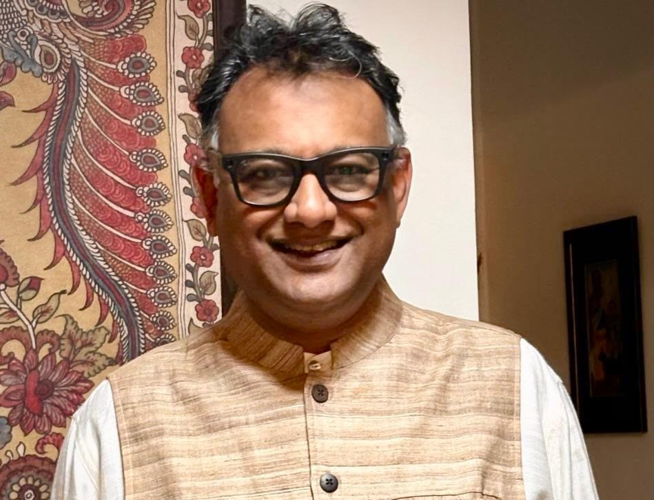 Nirav Manubhai, in conversation at the threshold of his home on the web